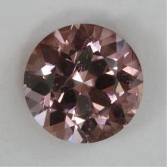 Nice medium lightly toned pink round.