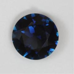 A very dark toned round with a great sapphire blue, flash drive, color.