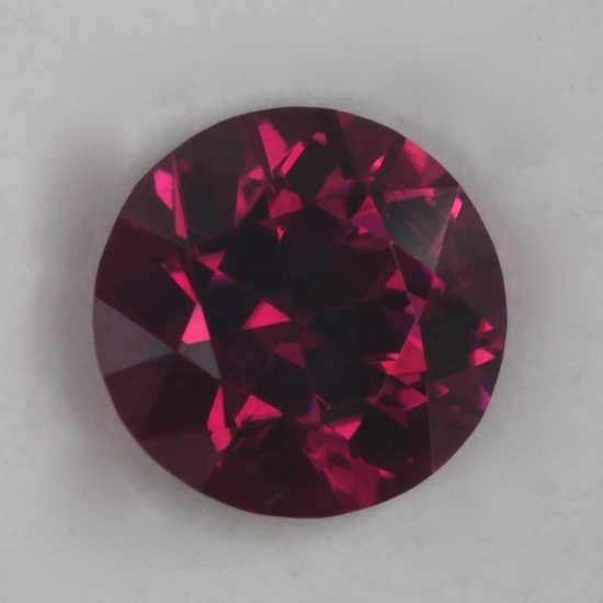 Excellent red pink that is eye clean and bright, droplet of color.  #7