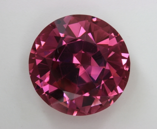 An eye clean, with great crystal, medium pink, deep round. Cuprian