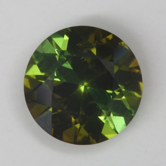 Alternate slice of pie areas of color, green and golden green round.  #183