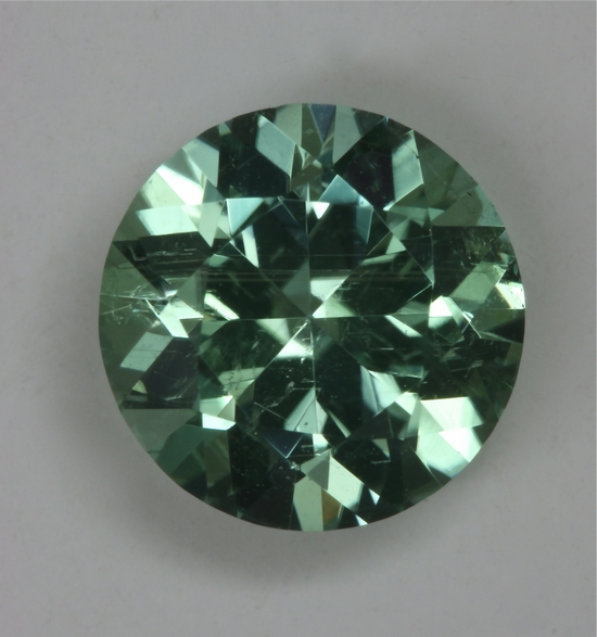 Medium toned minty blue green round.  #184