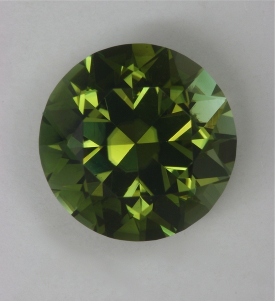 This yellow green is stong in the green, medium dark round.  #195