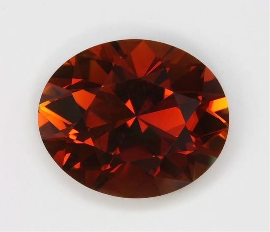 Bright flashy mahogany color in an eye clean oval.  #278