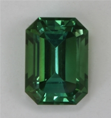 Bright, medium toned, blue green emerald cut.  #353