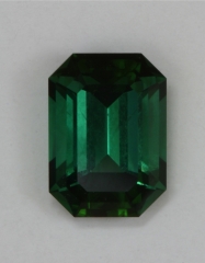 Find, medium plus toned, grass green emerald cut.  #358