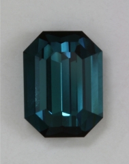 Closed and steeply cut ends on blue with a touch of green, emerald cut.  #375