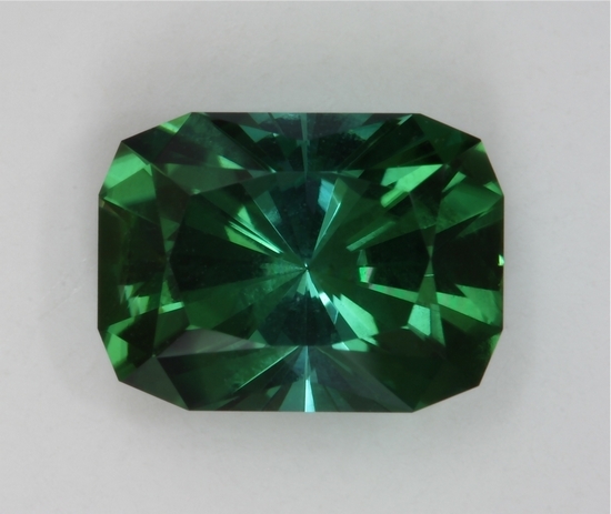 Barion cushion cut, eye clean, medium tone level blue green.  Afghanistan.  #435