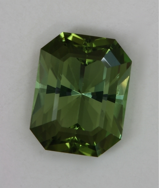Hexagonal cut, vegetable juice green tourmaline.  #447