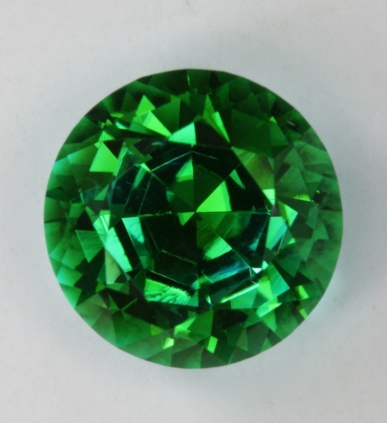 Rich, intense, cuprian bicolor of cyan and emerald green round.  #942