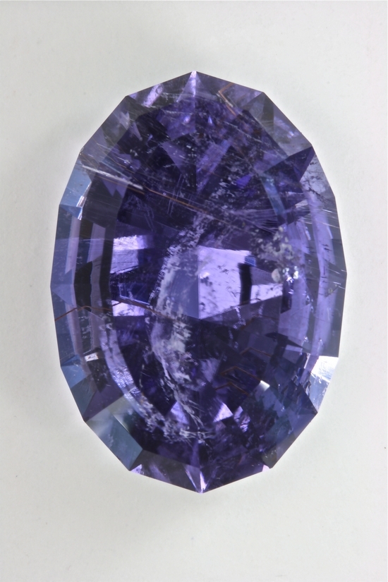 Laurellite, cuprian, blue purple oval from Mozambique.  Included.