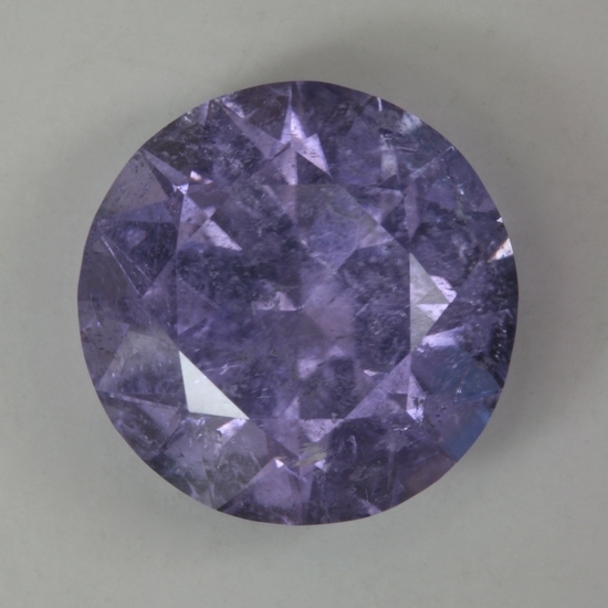 Moderately included cuprian Laurellite, round.  #999