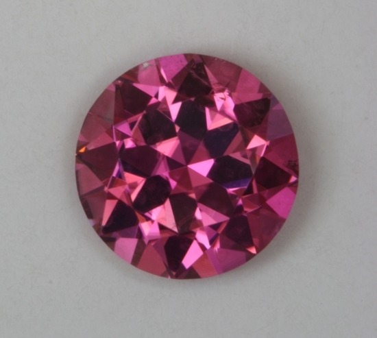 Nice hotter pink in an eye clean, with fine crystal, round.