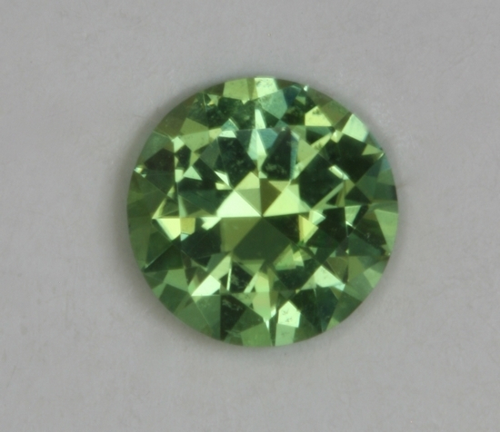 Medium toned, green dot of color.