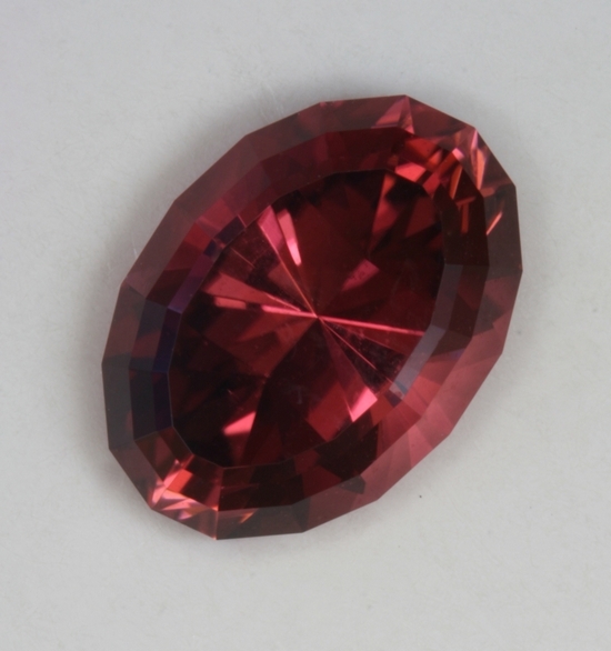 Pink peach slider with darker overtone, oval