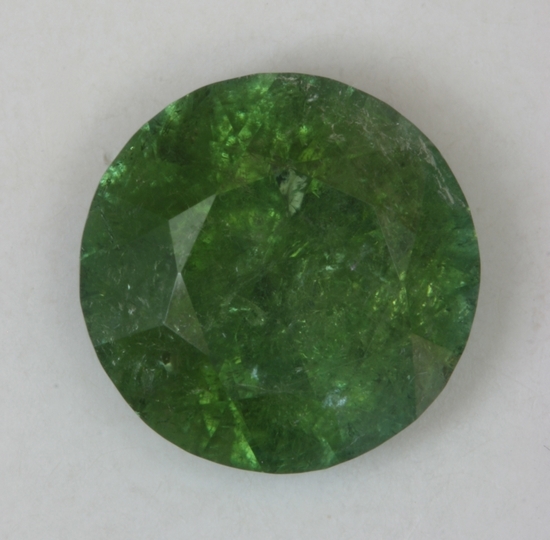 Heavily include with interesting green color, round