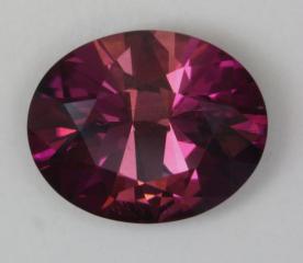 Dichroic Pink Oval with Richer Pink Ends.