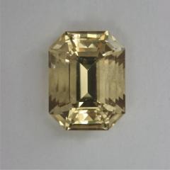 Included creamy yellow emerald cut.