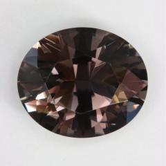 Moderately dark gray oval that was probably heated.