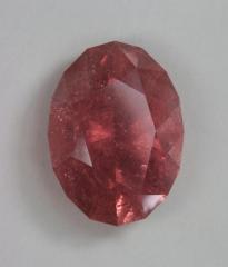 Heavily included melon orange oval.