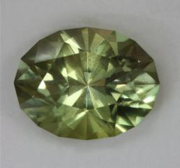 A bit of green yellow with a great bright presences, oval