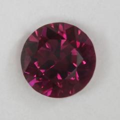 Darker orange pink droplet of color.