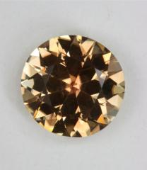 Slightly brownish tea to yellow round.