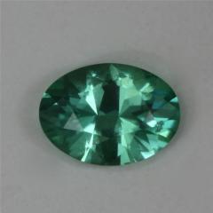 Dichroic green with bluer ends, oval