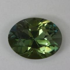 Very transparent dichroic green oval.