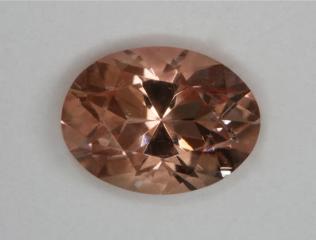 A dravite with golden flash oval.