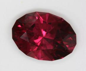 A stately oval with a rich pink color and  tone level that approaches red.