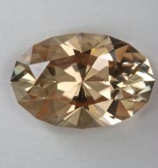 Slightlly included dichroic  pale peach with cream end  oval