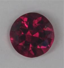 Rich. saturated, red round of Rubellite.