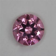 A very bright pink of medium tone level, droplet of color.