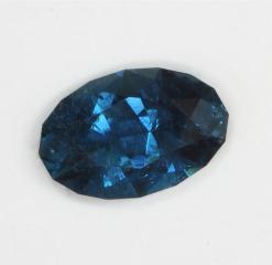 Sleepy, dichroic, medium dark blue oval