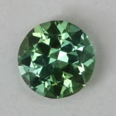 Beautiful seafoam with one spot of an inclusion, droplet of color.