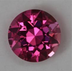 Bright, eye clean, medium hot pink, droplet of color