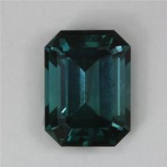 A bit of gray makes this blue emerald cut a formal presence