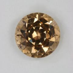 Yellow copper deeply cut round.