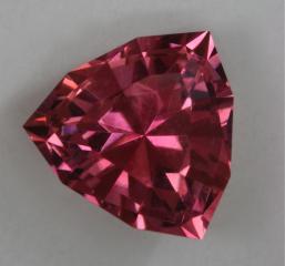 Bright Flashy Pink with a dash of orange shield cut.