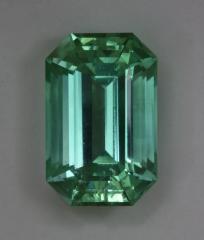 Lightly included, but a GEM in my heart anyway, emerald cut.
