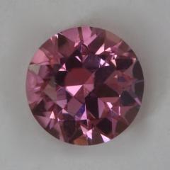 Nice, eye clean, medium light pink, round from Afghanistan