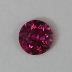 A medium dark pink round that is a dot of color.
