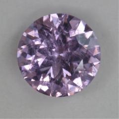 Nice moderately light lavender, included droplet of color, with copper