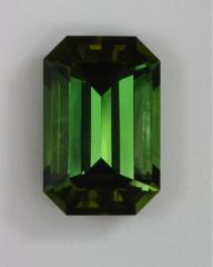 Average emerald cut with closed ends, but superior green color