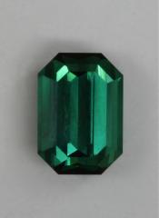 Nice average blue green emerald cut with normal ends