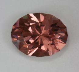 A fine stable orange that is clean and bright, oval.