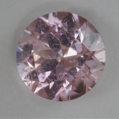 Faintly included, lightly toned pink, Afghan, round.