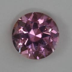 A medium toned pink with a touch of cuprian violet, round.