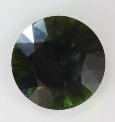 Large rich green tourmaline. with a difference.